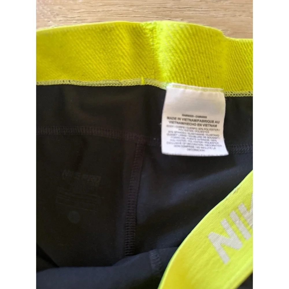 Nike Pro Black Athletic Shorts with Yellow Waistband